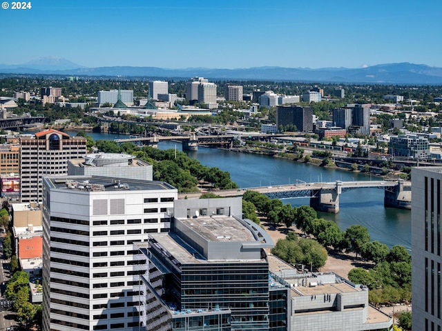 bird's eye view with a water and mountain view