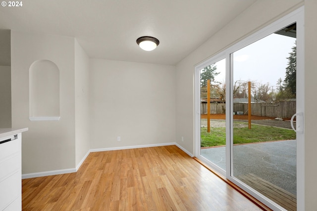 unfurnished room featuring light hardwood / wood-style flooring