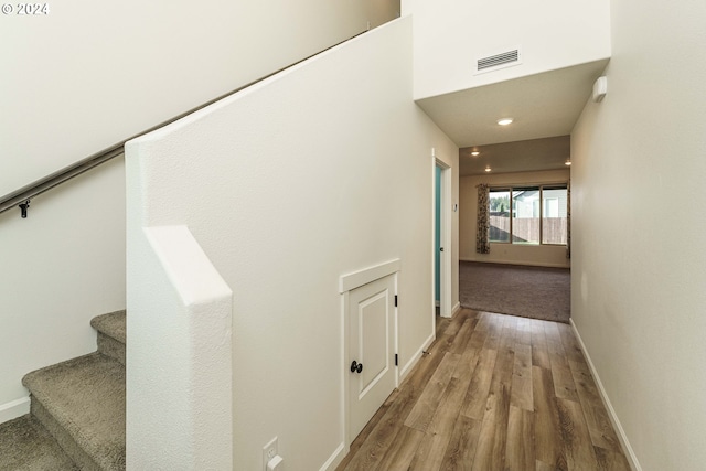 hallway featuring wood-type flooring