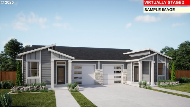 view of front of home with a garage, concrete driveway, board and batten siding, and fence