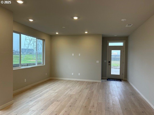 interior space with light hardwood / wood-style flooring