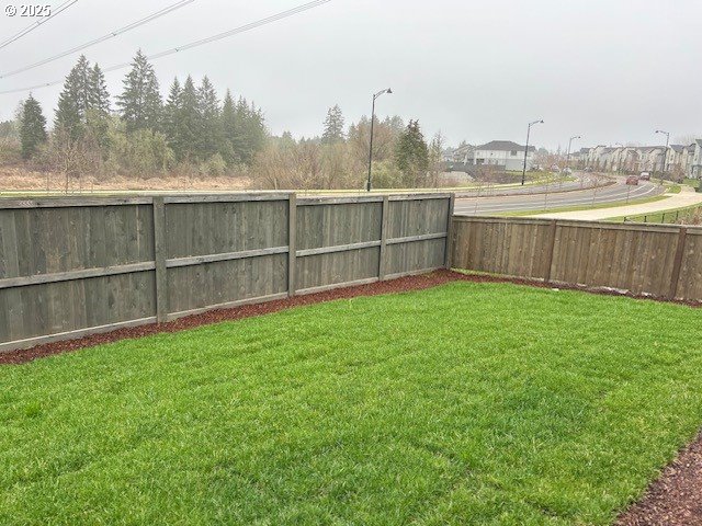 view of yard with fence