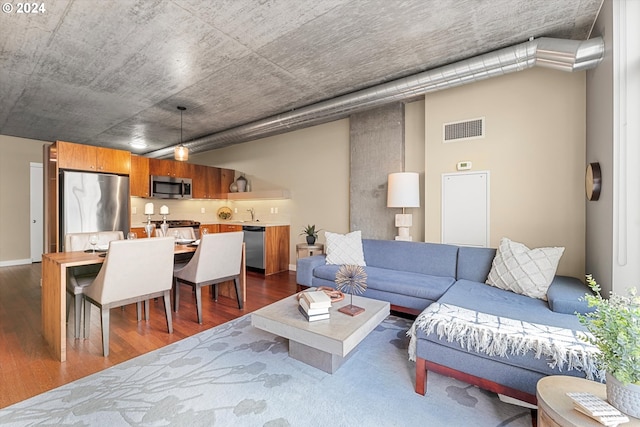 living room with dark wood-type flooring