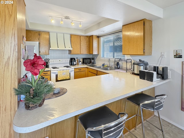 kitchen with custom range hood, kitchen peninsula, and white electric range oven