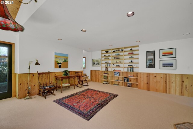 49356 Mckenzie Hwy, Vida, OR 97488 - sitting room featuring healthy amount of natural light, carpet flooring, recessed lighting, and wood walls