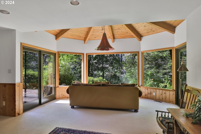 living room featuring plenty of natural light and wooden ceiling