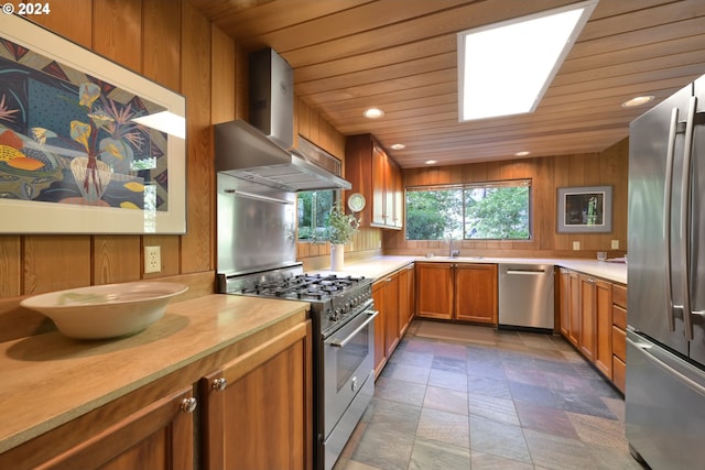 49356 Mckenzie Hwy, Vida, OR 97488 - kitchen featuring stainless steel appliances, ventilation hood, wood ceiling, brown cabinets, and a sink