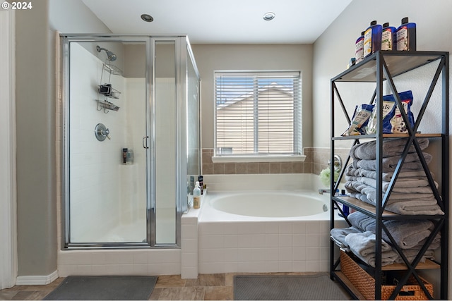 bathroom with independent shower and bath