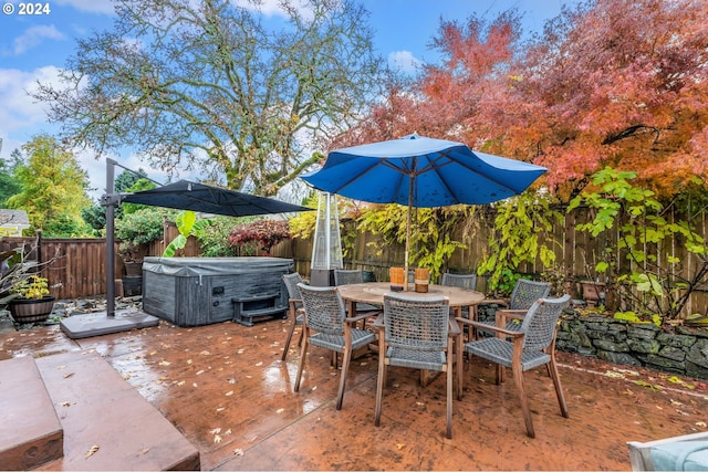 view of patio featuring a hot tub