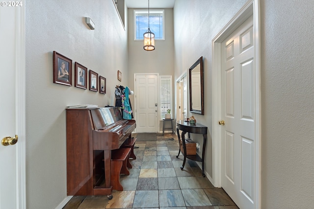 foyer entrance featuring a high ceiling