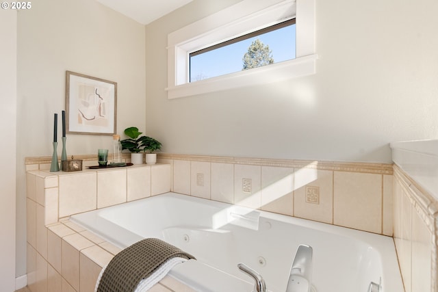 bathroom with tiled tub