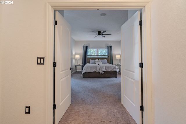 bedroom featuring carpet floors and a ceiling fan