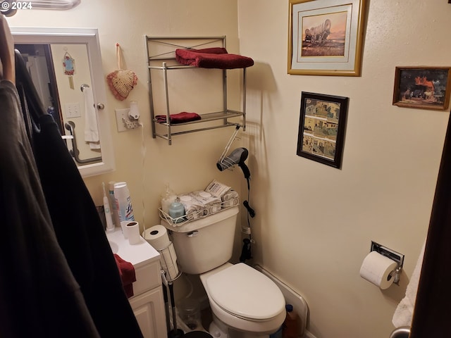 160 Spring St, Gardiner, OR 97441 - bathroom with vanity and toilet