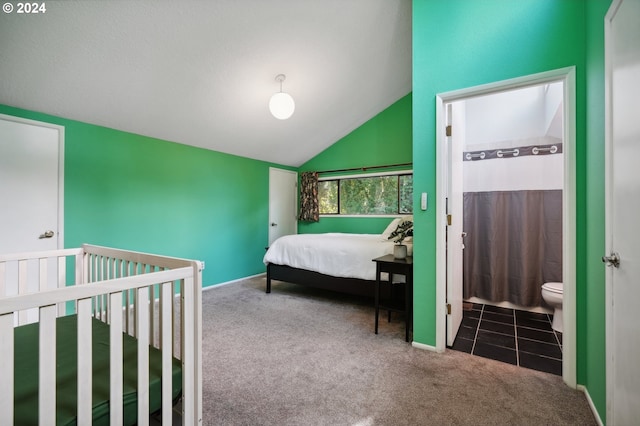 bedroom with lofted ceiling and carpet