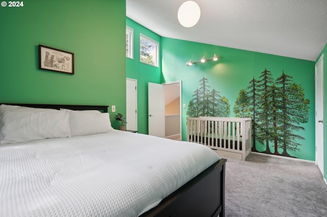 carpeted bedroom with a towering ceiling