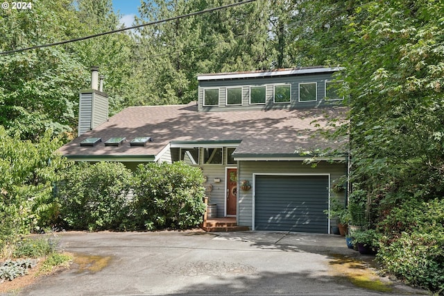 front of property featuring a garage