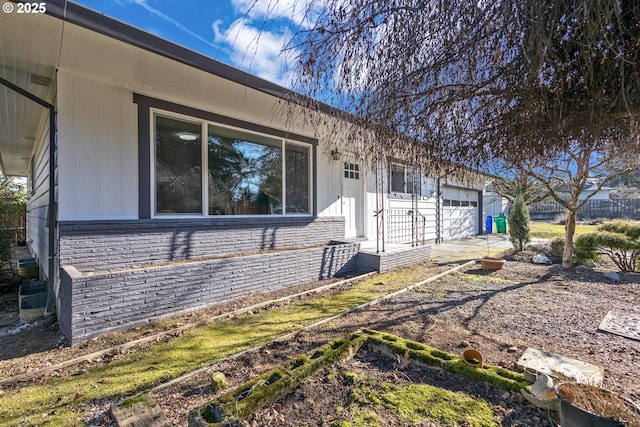 view of home's exterior with a garage