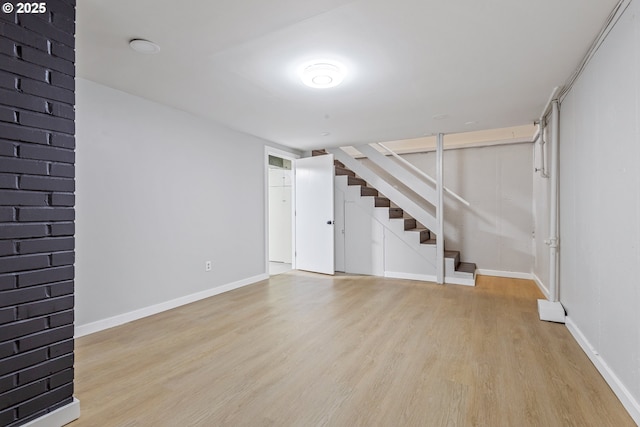 basement with light wood-type flooring