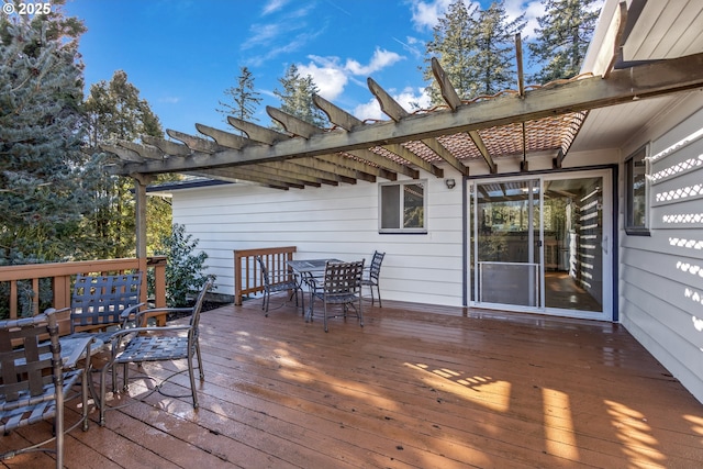 wooden deck with a pergola