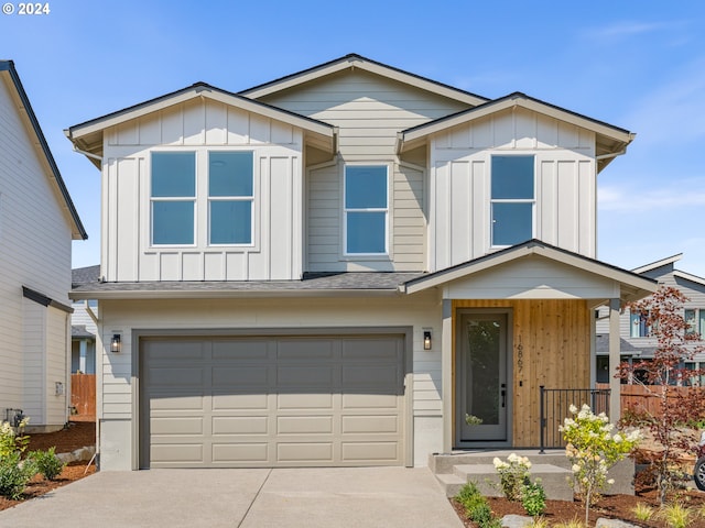 view of front of property with a garage