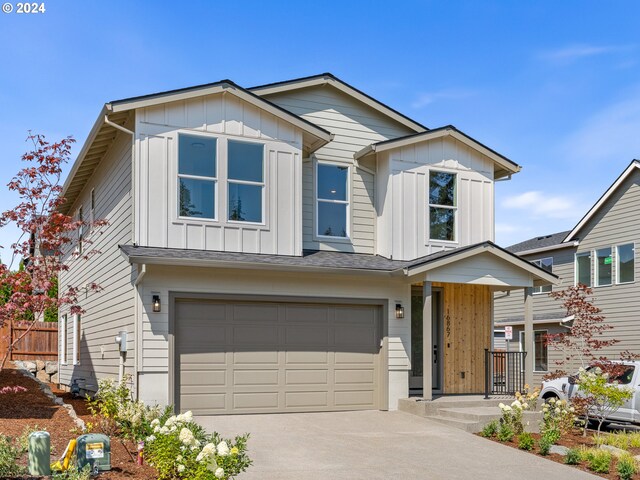 view of front of property with a garage