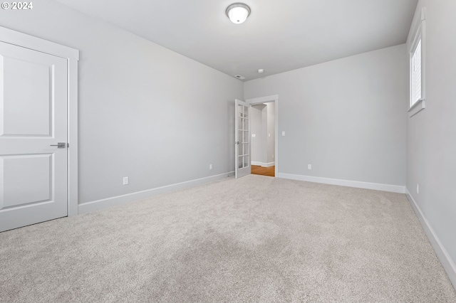 unfurnished bedroom with carpet flooring