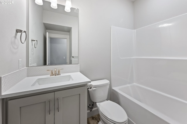 full bathroom with shower / tub combination, vanity, and toilet