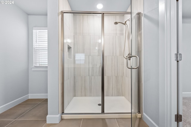 bathroom featuring tile patterned floors and walk in shower