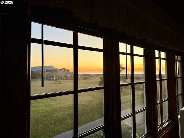 doorway to outside with a mountain view