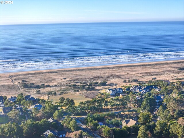 exterior space with a beach view