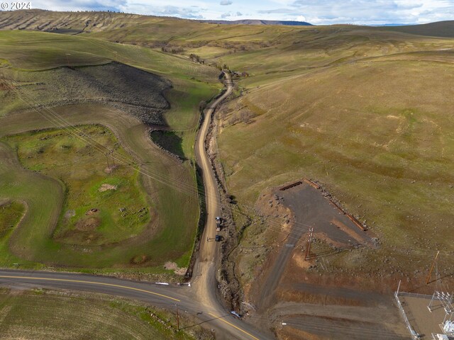 birds eye view of property featuring a rural view