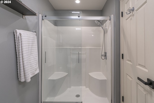 bathroom with an enclosed shower