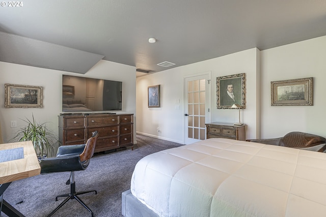 bedroom featuring dark carpet