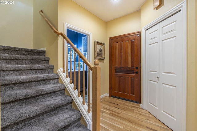 entrance foyer with light hardwood / wood-style floors