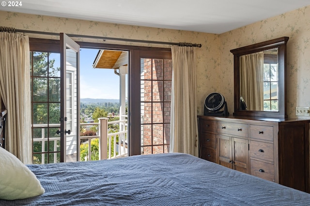 bedroom featuring access to outside