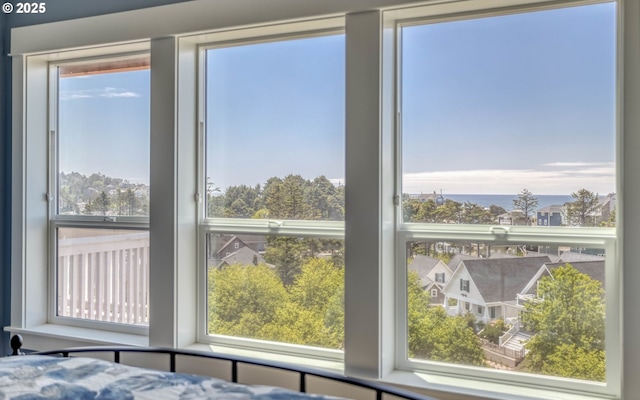 unfurnished bedroom featuring multiple windows