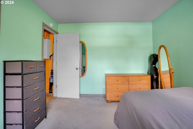 bedroom featuring a textured ceiling