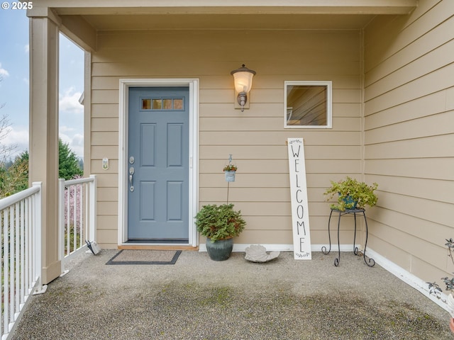 entrance to property with covered porch