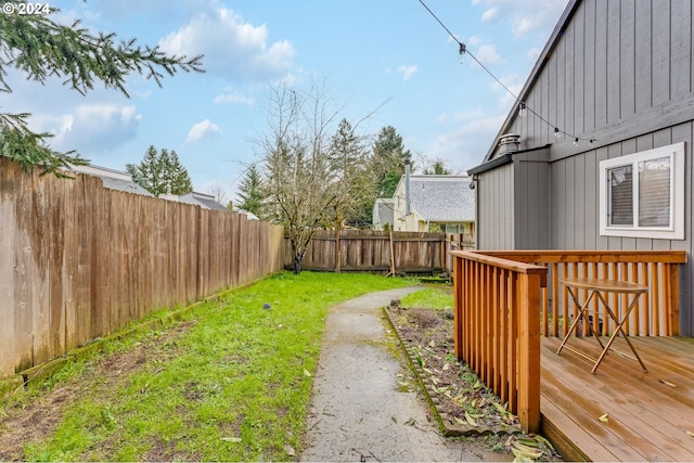 view of yard featuring a deck