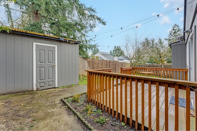 deck featuring a shed