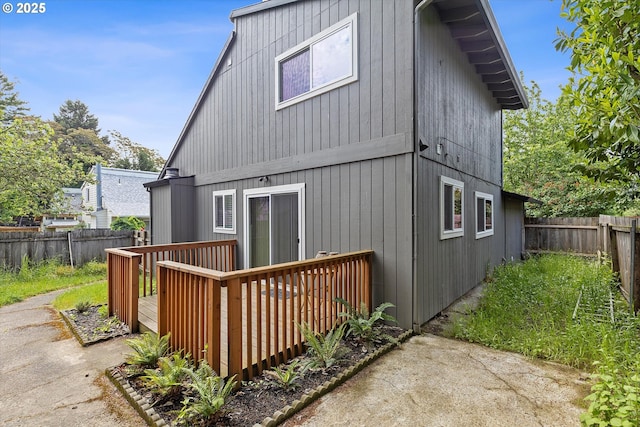8941 SE Knapp St, Portland, OR 97266 - rear view of house with a wooden deck and a fenced backyard