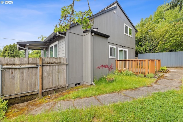 8941 SE Knapp St, Portland, OR 97266 - view of property exterior featuring fence and a deck