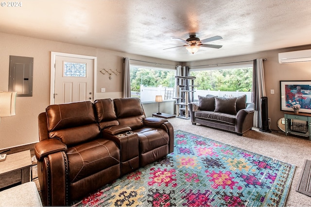 carpeted living room with a wealth of natural light, ceiling fan, electric panel, and a textured ceiling