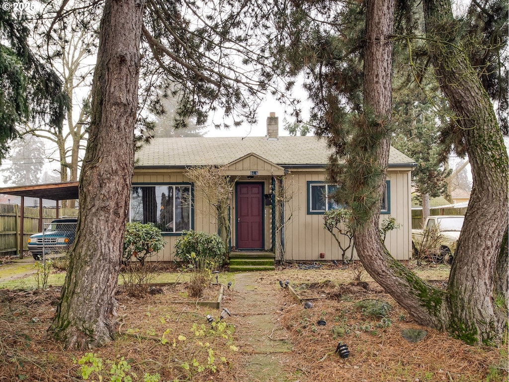 view of front of home with a carport