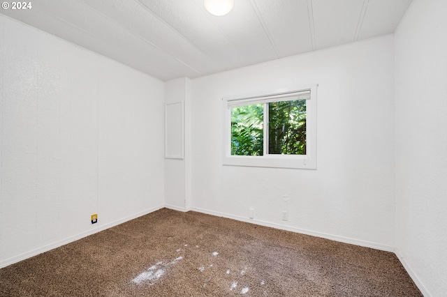 empty room with carpet flooring