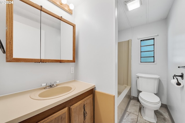 full bathroom with vanity, tub / shower combination, and toilet