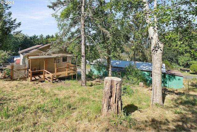 view of yard featuring a deck