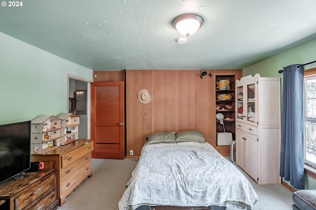 bedroom with light carpet