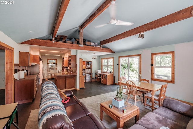 living room featuring an inviting chandelier and vaulted ceiling with beams