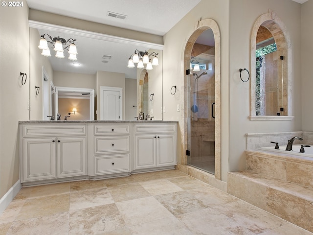 bathroom featuring double vanity, a stall shower, a garden tub, and visible vents